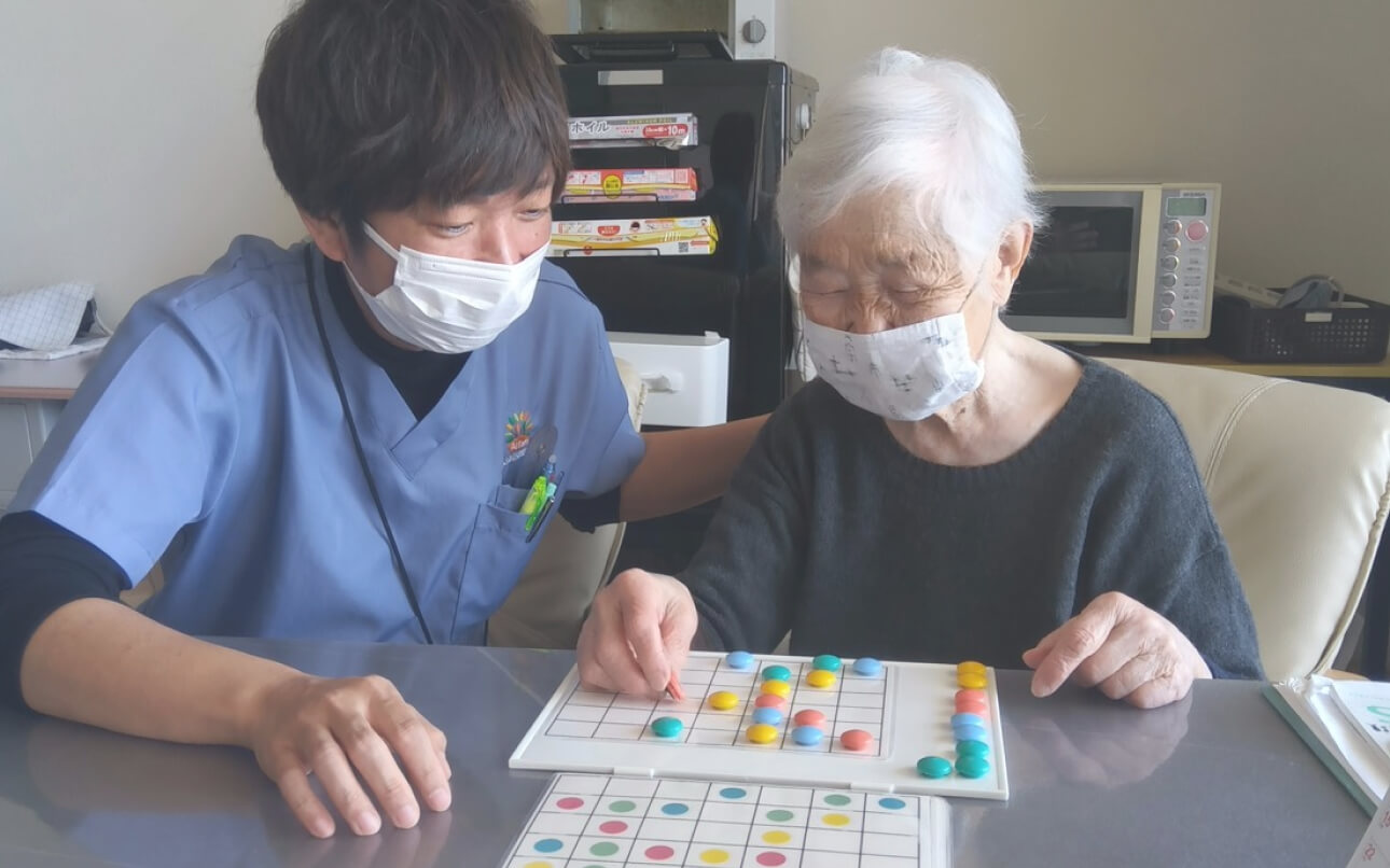 訪問看護師とご利用者様の写真